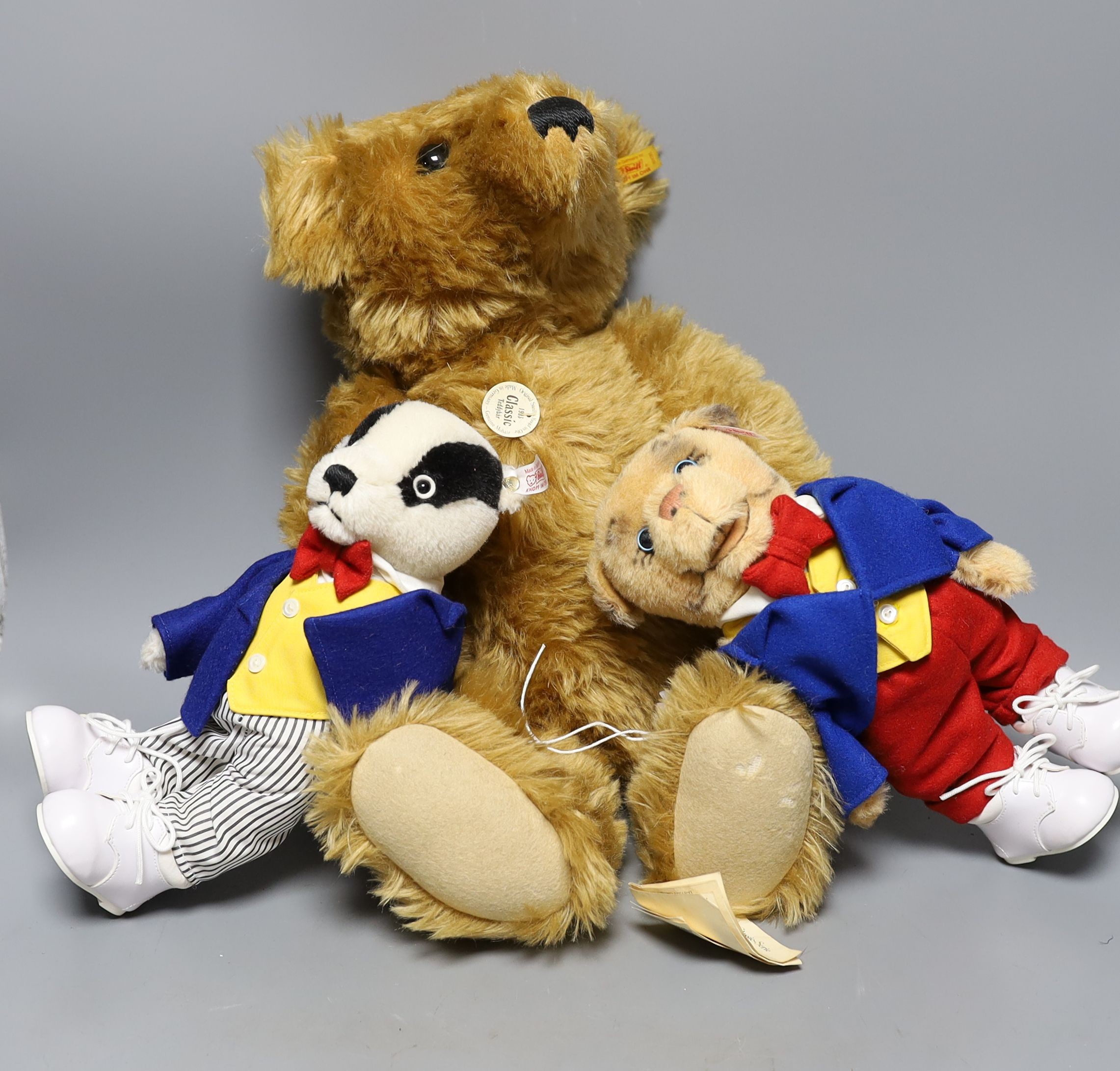 Steiff Classic 1903 bear with Steiff Limited Edition 'Algy' Pug from Rupert Series with Steiff Limited Edition 'Bill the Badger', Rupert Series both with box and certificate, bear 47 cms high.
